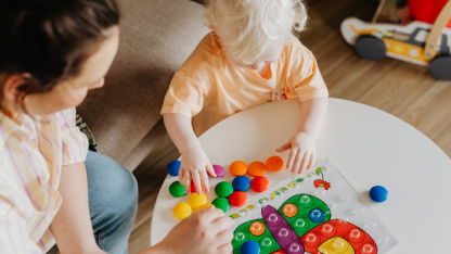Cute baby playing with toys